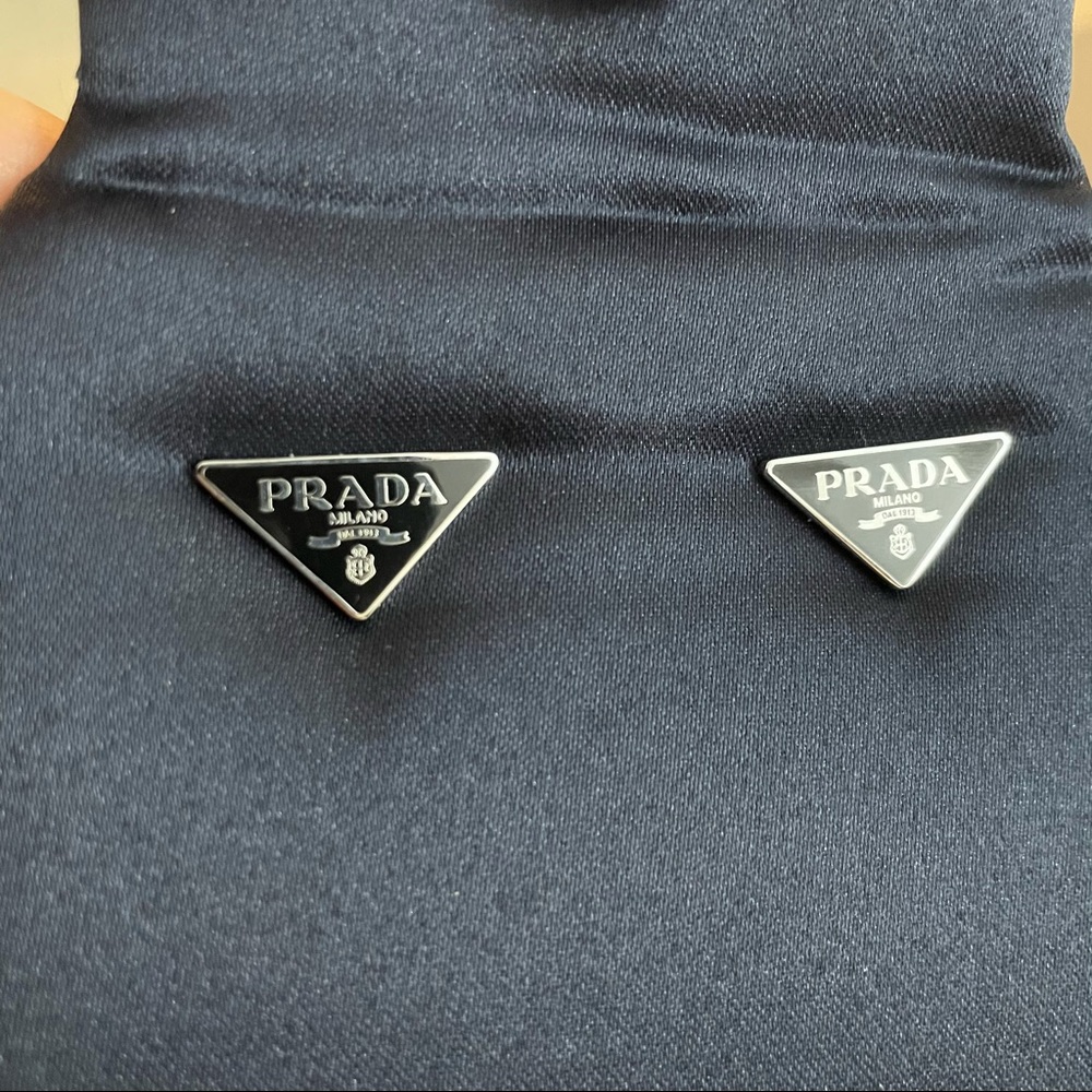 Prada symbole earrings never worn